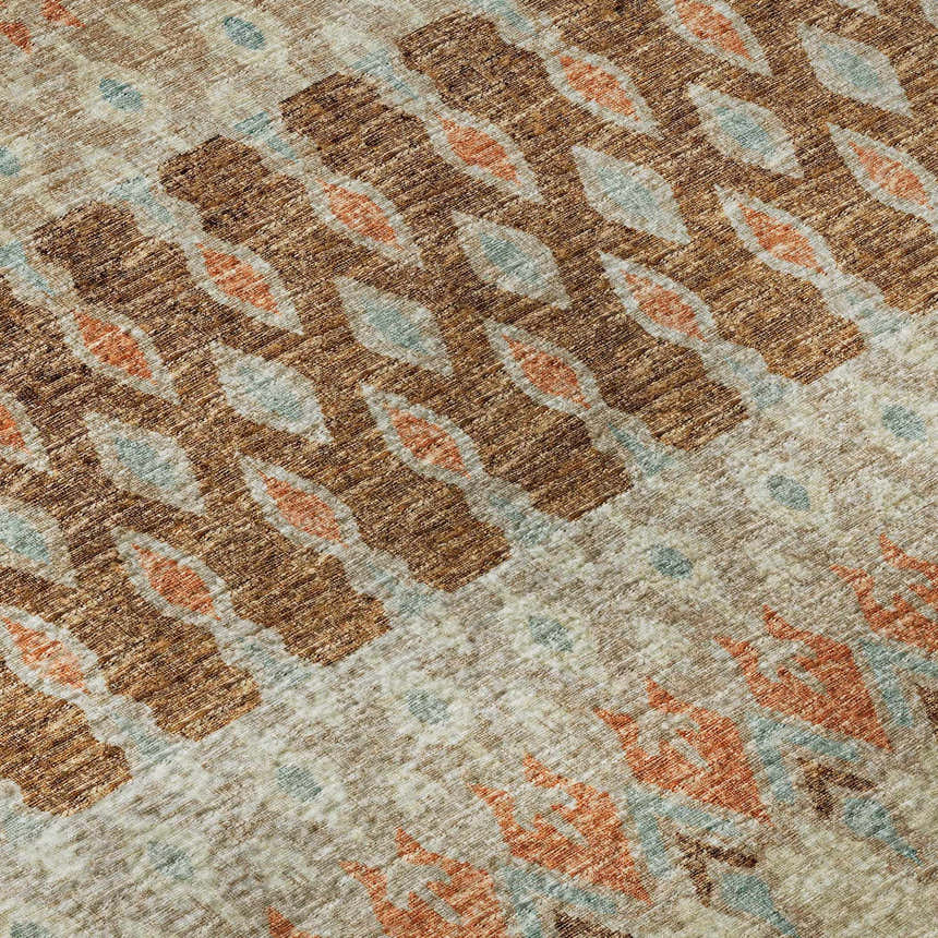 Close-up of the Dalyn Brisbane BR1 Mocha Washable Area Rug. Beige, brown, paprika, and light blue diamond pattern.