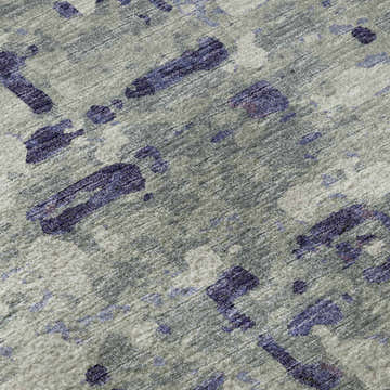 Close-up of the Dalyn Brisbane BR5 Eggplant Washable Area Rug. Features a taupe background with dark purple abstract shapes.