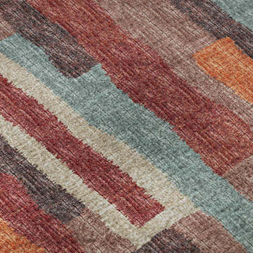 Close-up of Dalyn Brisbane BR7 Canyon Washable Area Rug. Features beige, brown, paprika, and spa blue stripes.