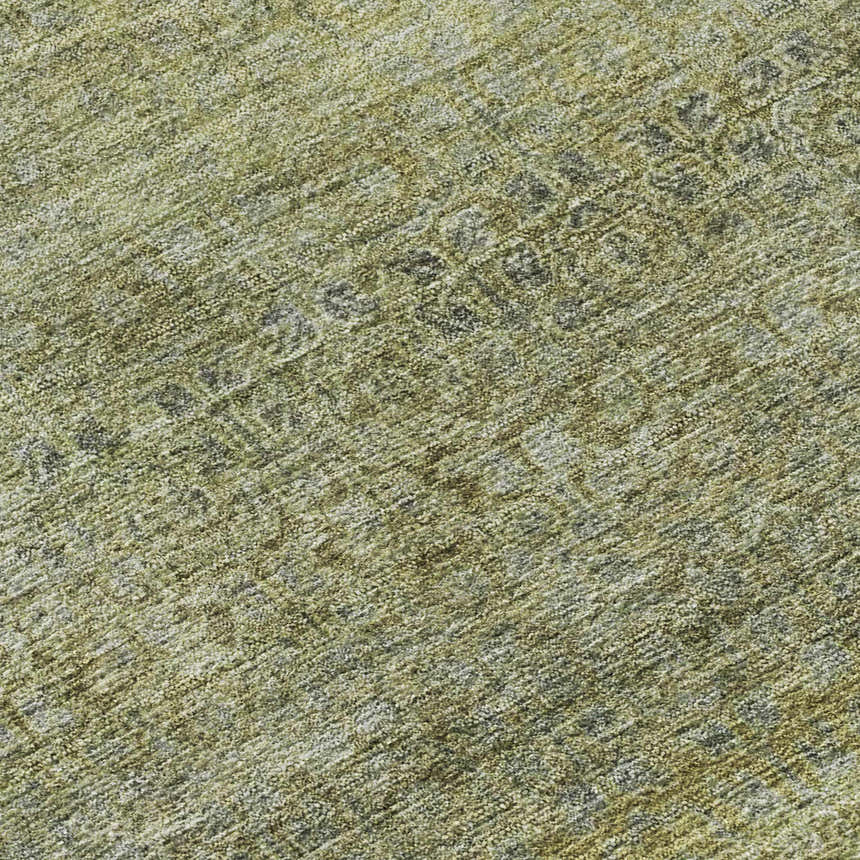 Close-up of the Aloe Dalyn Luxury Burano BU12 Rug. The rug has a textured, heathered pattern in aloe, beige, green, and taupe.