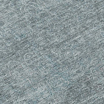 Close-up of Dalyn Luxury Burano BU1 Seafoam Washable Area Rug, featuring a textured pattern in denim, light blue, and sage.