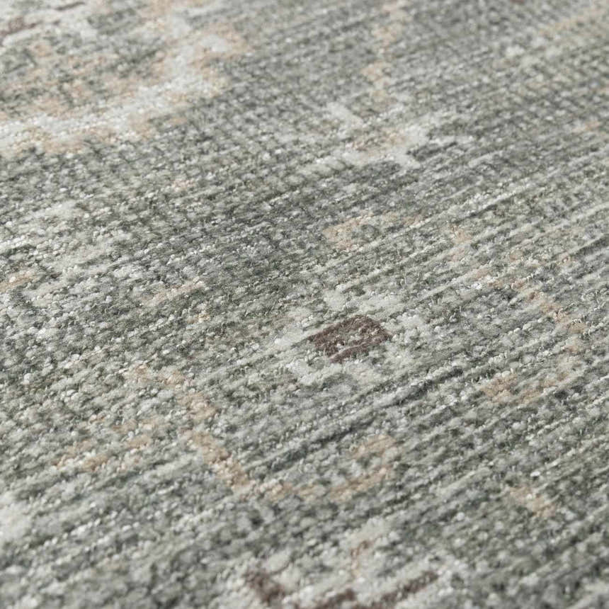Close-up of the Collins Avenue I Vintage Oushak Area Rug. Soft texture with beige, gray, and dark brown vintage-style pattern. Texture