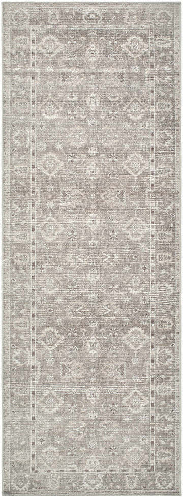 Close-up of the Collins Avenue II Vintage Oushak Area Rug. Machine-woven polyester rug in light gray, tan, and dark red. Design-Runner-273