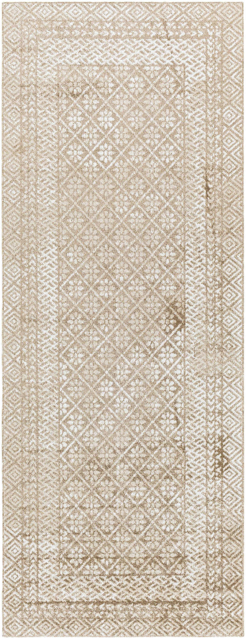 Close-up of the Caditaan Washable Area Rug. Brown and cream rug with a traditional diamond and floral pattern. Design-Runner-2773
