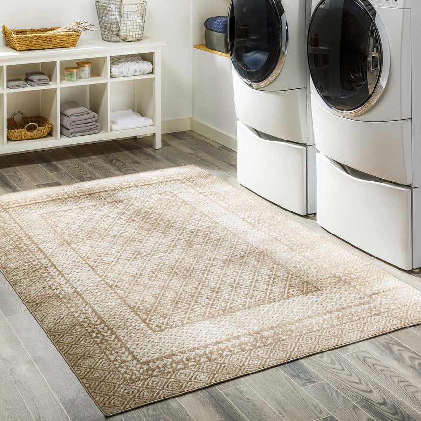 Laundry room with white washer/dryer and beige Caditaan Washable Area Rug. White shelving with towels and baskets. Roomscene-Rectangle