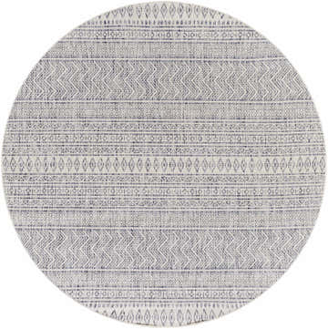 Close-up of the round Madras Navy All Over Performance Rug with a bohemian-inspired geometric pattern in blue, gray, and off-white. Design-Round-67