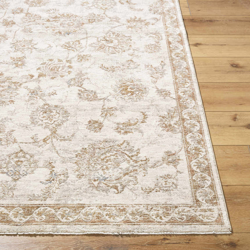 Close-up of the Chyron Cream Area Rug, a traditional rug with cream, tan, and light brown floral patterns. Front