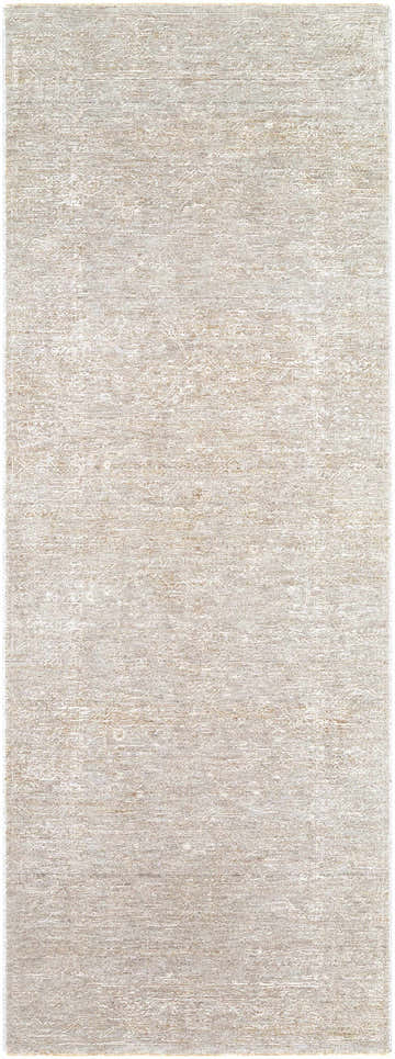 Close-up of the Catrin Area Rug, a machine-woven rug in light sage, light slate, and slate blue with a subtle traditional pattern. Design-Runner-2710