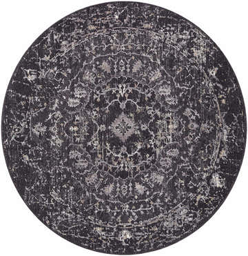Close-up of round Corina Black Area Rug. Farmhouse style rug in black, charcoal, gray, and ivory with a traditional pattern. Design-Round-53