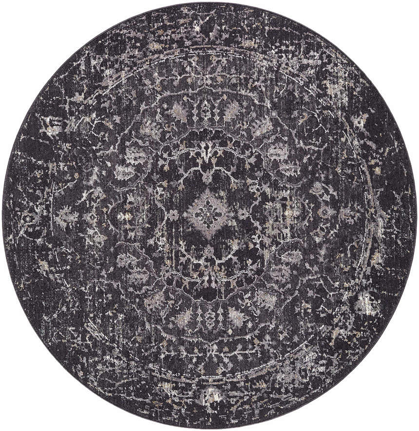 Close-up of round Corina Black Area Rug. Farmhouse style rug in black, charcoal, gray, and ivory with a traditional pattern. Design-Round-53