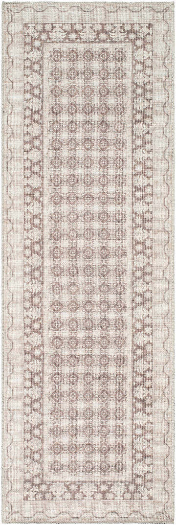 Close-up of the Rainier Light Brown Washable Rug. Farmhouse style rug with cream, dark brown, and light brown geometric pattern. Design-Runner-27710