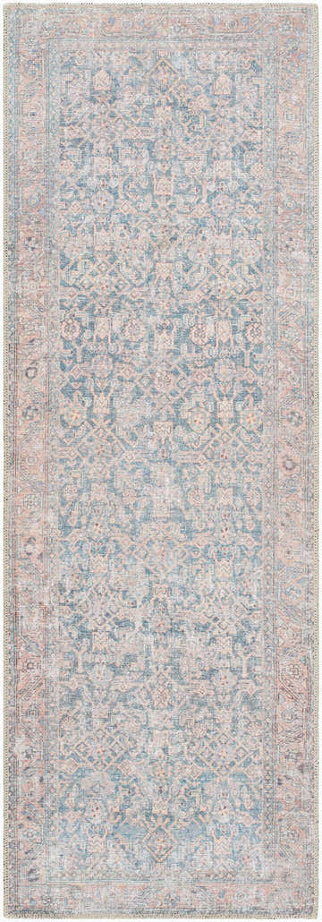 Close-up of the Crevan Washable Area Rug. Traditional style rug in denim blue, tan, and dark red with a detailed pattern. Design-Runner-2211