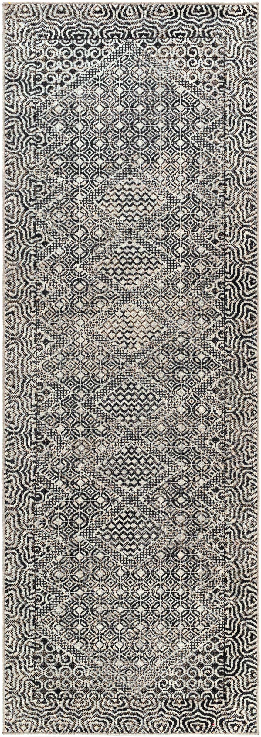 Close-up of the Coledale Black & White Washable Rug. Features a detailed oriental pattern in black, gray, and light gray. Design-Runner-2773