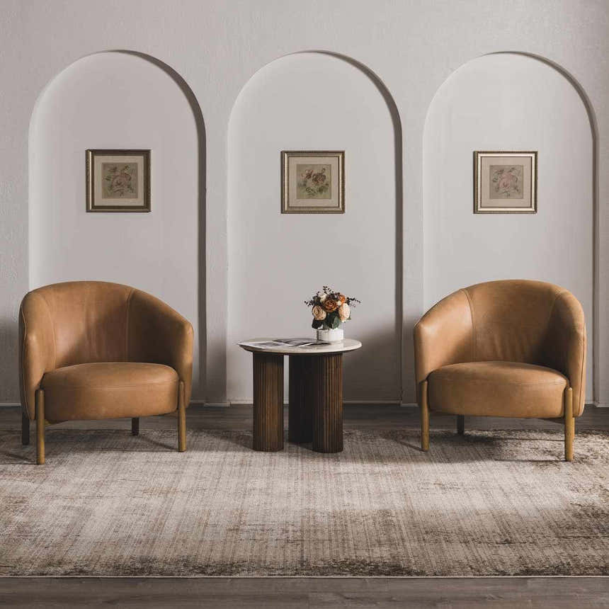 Living room scene with camel chairs and Myrtle Avenue Galey Alix x LIVABLISS GAMY-2303 Area Rug in cream and brown tones. Roomscene-Rectangle