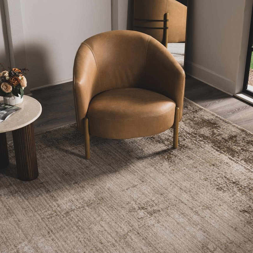 Living room scene with camel leather chair on Myrtle Avenue Galey Alix x LIVABLISS GAMY-2303 area rug. Roomscene-Rectangle