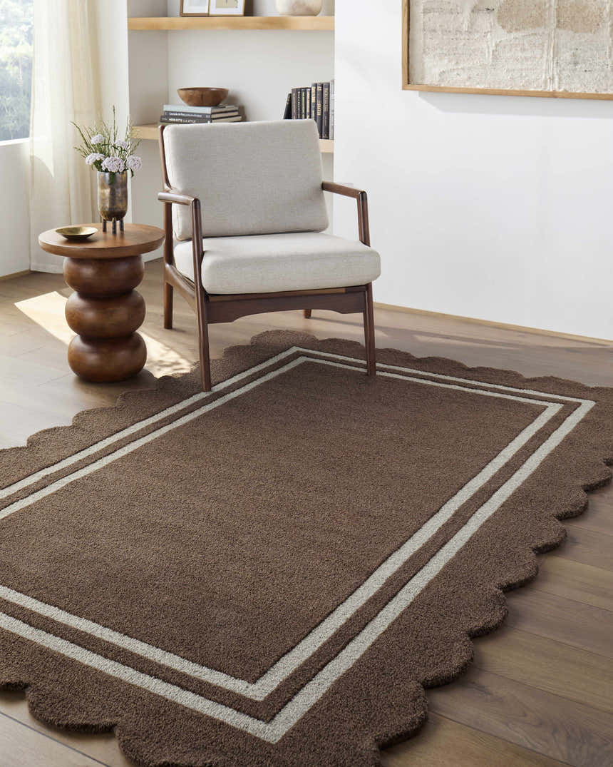 Living room scene with a Chogan Chocolate Brown area rug, modern chair, and wood side table. Roomscene-Rectangle
