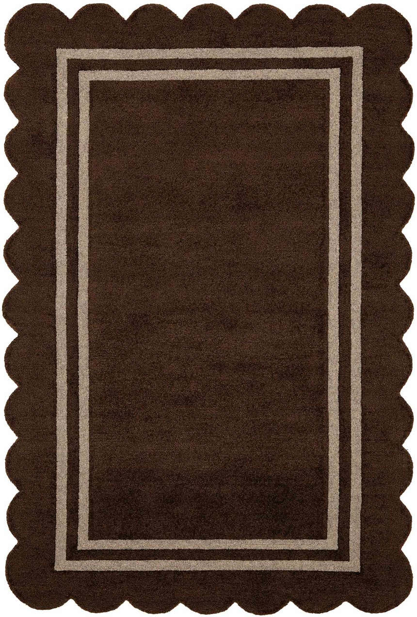 Close-up of the hand-tufted Chogan Chocolate Brown Area Rug. Features a scalloped edge and double border. 100% wool rug. Design-Rectangle