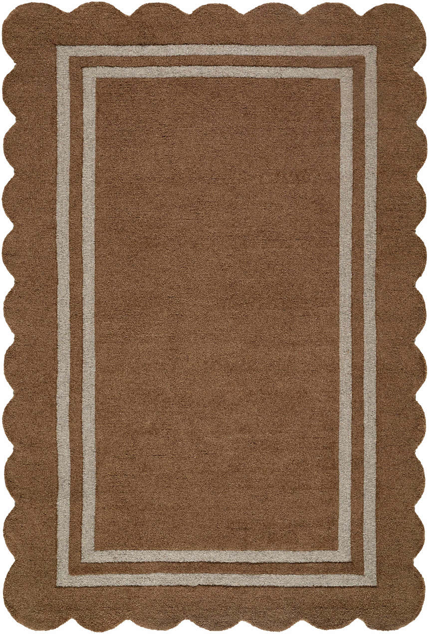 Close-up of the hand-tufted Chogan Umber Area Rug, a wool rug with a brown center, gray border, and scalloped edge. Design-Rectangle-576