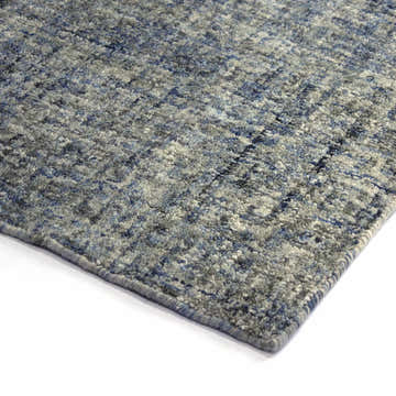 Close-up of the hand-tufted Dalyn Calisa CS5 Indigo Area Rug, showing its wool texture and shades of blue and gray.