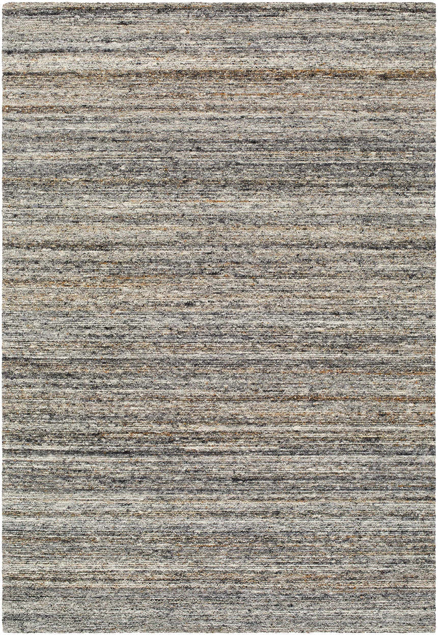 Close-up of the hand-tufted Capote Tan Area Rug. Features ash, charcoal, slate blue, tan, and taupe hues in a horizontal stripe design. Design-Rectangle-576