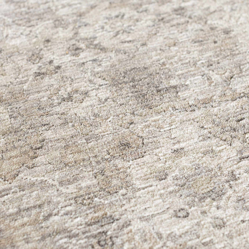 Close up of the Dalyn Cyprus CY10 Gray Area Rug showing beige, ivory, and gray traditional pattern and soft texture.