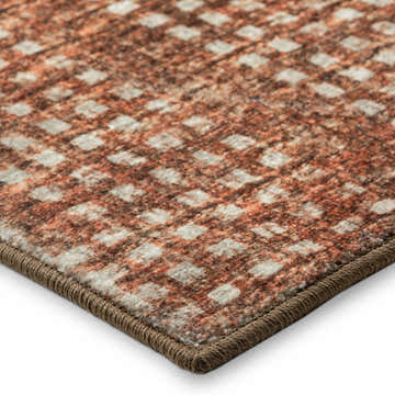 Close-up of the Dalyn Delano DA1 Paprika area rug featuring a brown, paprika, and light brown checkered pattern.