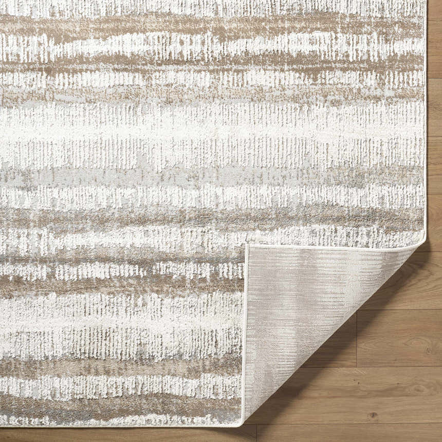 Close-up of the Asmara Brown Area Rug showing its contemporary horizontal stripe design and textured pile. Fold