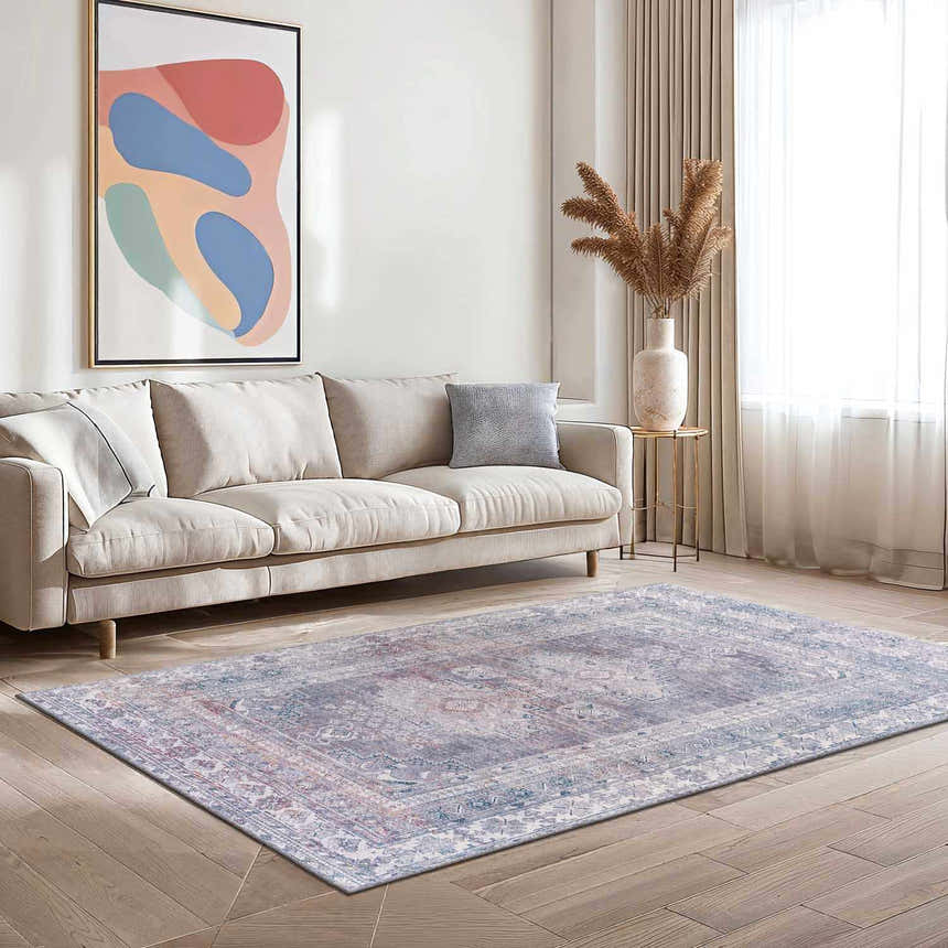 Living room with a beige sofa and Livabliss Colin CLN-2304 rug in charcoal, cream, and red tones. Roomscene-Rectangle