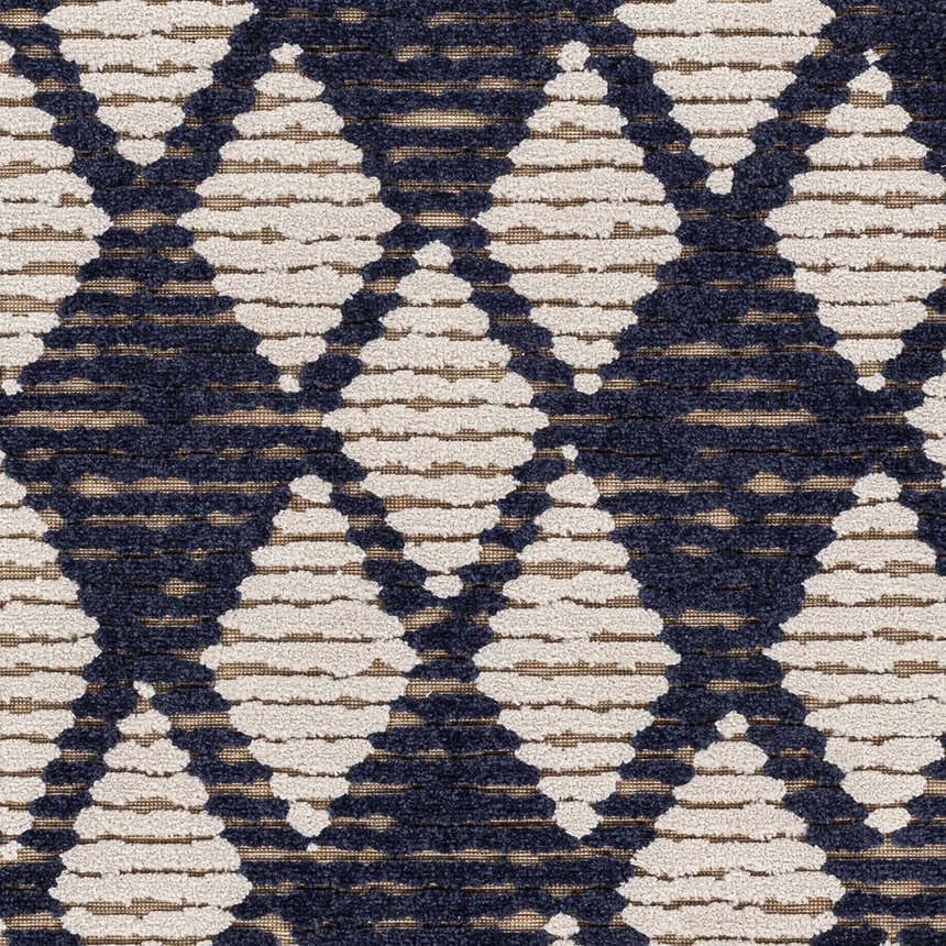 Close-up of Enhaut 3D Outdoor Area Rug. Bone and cloud gray geometric diamond pattern. Machine woven texture. Swatch