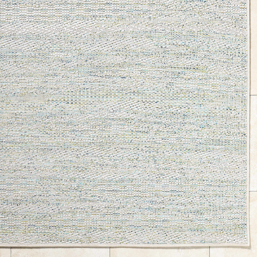 Alezae Ivory Area Rug