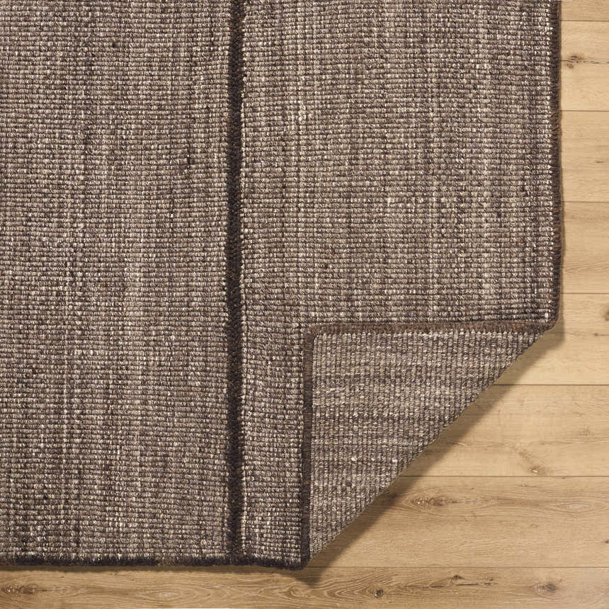 Close up of the hand woven Lisua Global Modern Wool Area Rug showing texture and detail. Fold