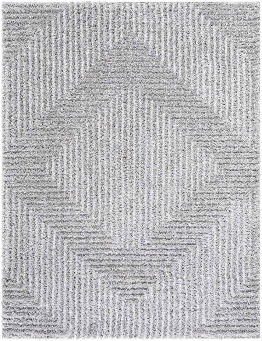 Close-up of the Ashlyn Gray Area Rug featuring a geometric pattern and shag texture in light slate and gray. Design-Rectangle-537