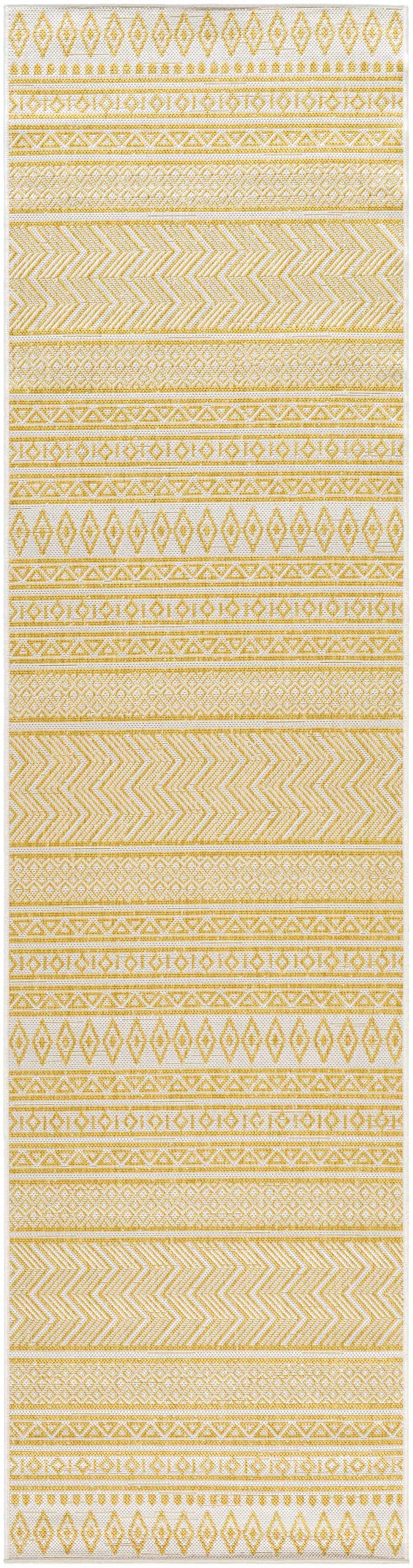Close-up of the Galal Area Rug. Beige and gold geometric patterns create a farmhouse, transitional design. Design-Runner-2710