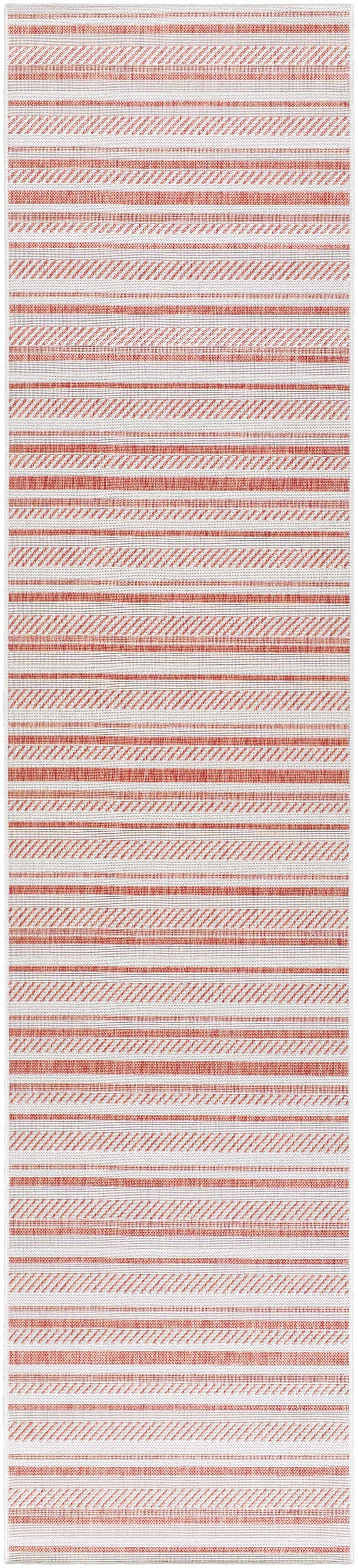 Close-up of the Garan Area Rug. Beige rug with terracotta stripes in horizontal and diagonal patterns. Design-Runner-2712