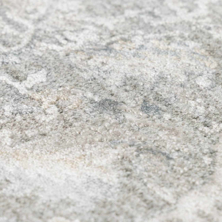 Close-up of the Glengarry Thick Luxe Boutique Rug, showing its plush texture and subtle gray, beige, and white tones. Texture