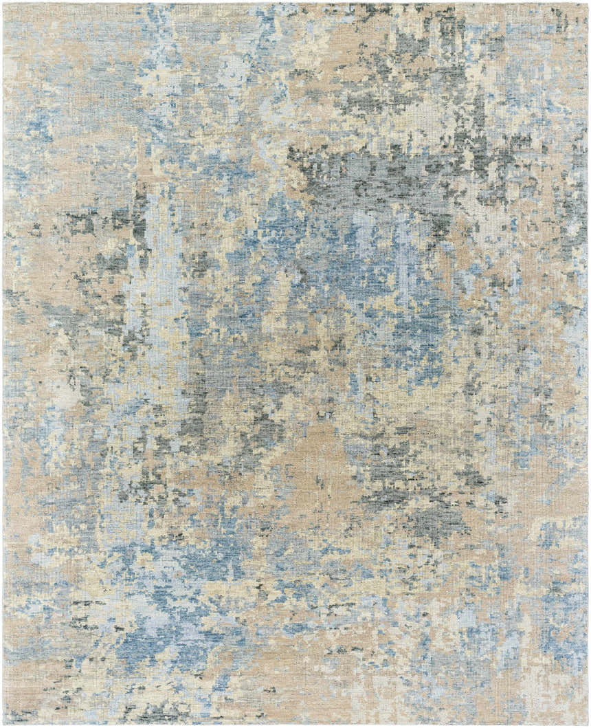 Close-up of the Greenhills Handmade Wool Area Rug, featuring beige, charcoal, and blue abstract patterns. Design-Rectangle-810