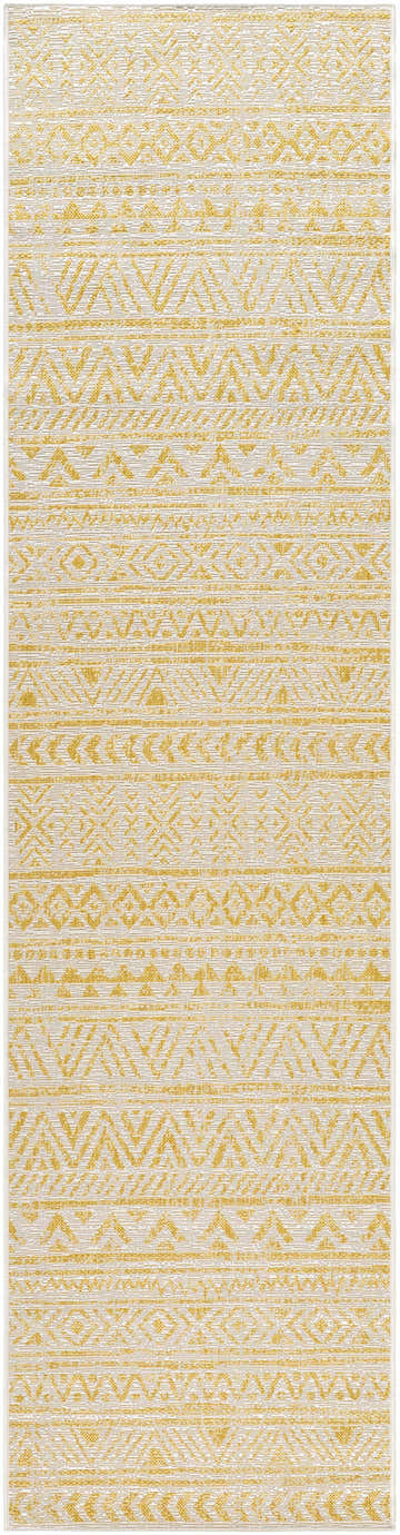 Close-up of the Haluk Area Rug in beige and brass. Features a geometric, tribal-inspired pattern. Farmhouse style. Design-Runner-2710