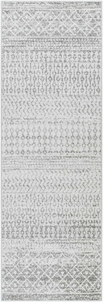 Close-up of the Constantin Gray Area Rug, showcasing its gray and white geometric, bohemian-inspired pattern. Design-Runner-2776