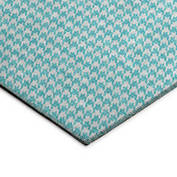 Close-up of Dalyn Hinton Aqua Washable Area Rug. Features a small-scale aqua and off-white houndstooth pattern.