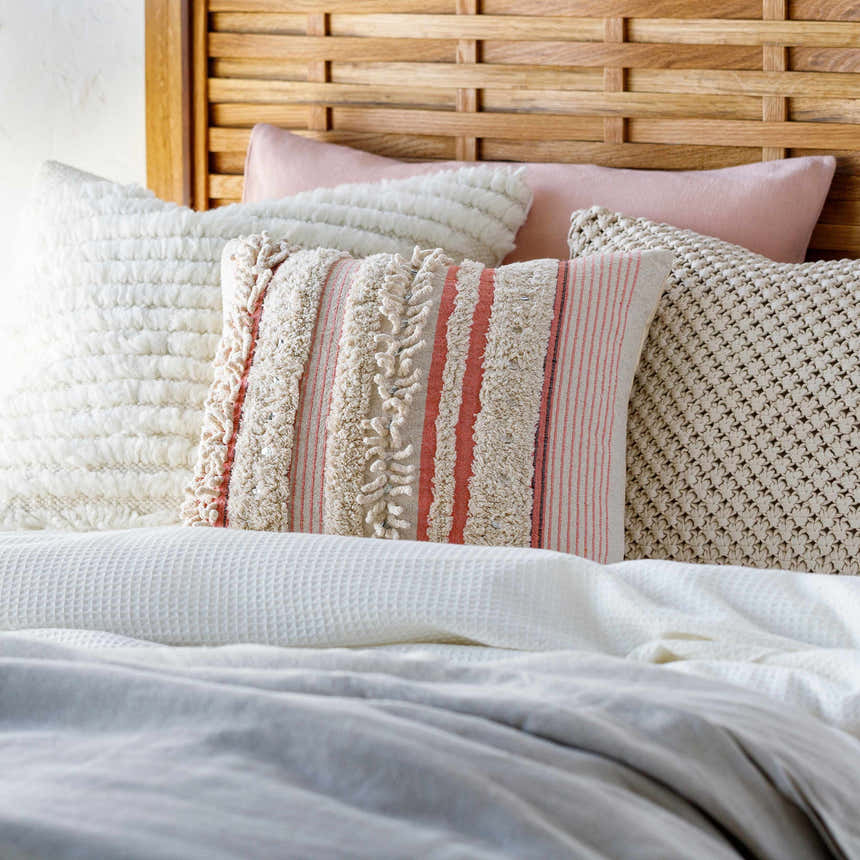 Hopatcong Peach Textured Striped Throw Pillow