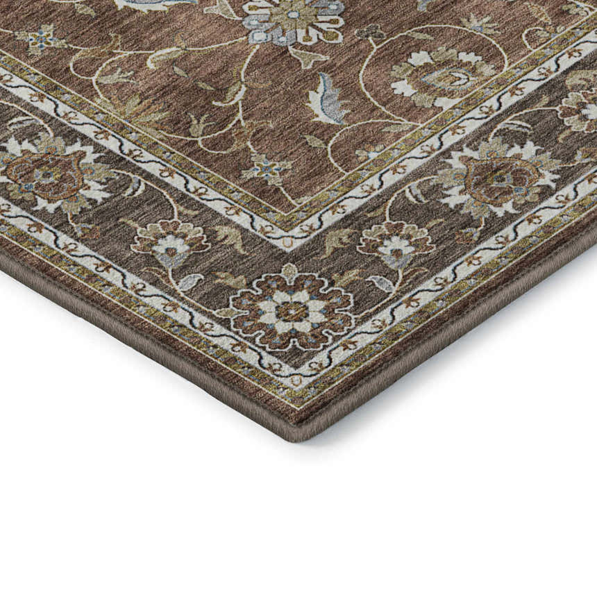 Close up of Dalyn Luxury Hatay HY1 Paprika Washable Area Rug with traditional floral pattern in beige, brown, and paprika.