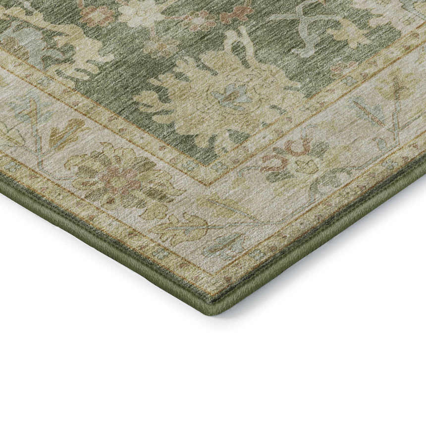 Close up of the Dalyn Luxury Hatay HY2 Aloe Washable Area Rug showing its traditional floral pattern and aloe green, beige, and caramel colors.