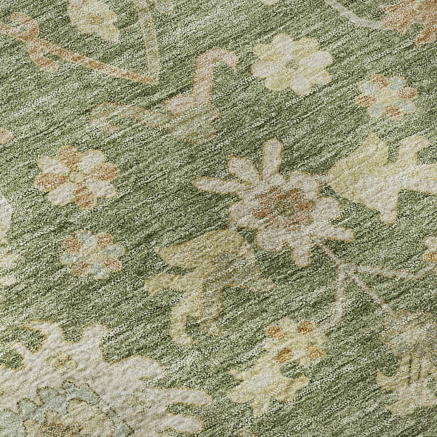 Close-up of Dalyn Luxury Hatay HY2 Aloe Washable Area Rug. Green rug with beige, caramel, and sage floral pattern.