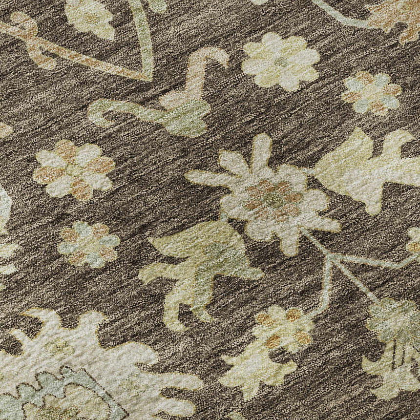 Close-up of Dalyn Luxury Hatay HY2 Chocolate Washable Area Rug. Brown rug with beige, caramel, and ivory floral pattern.