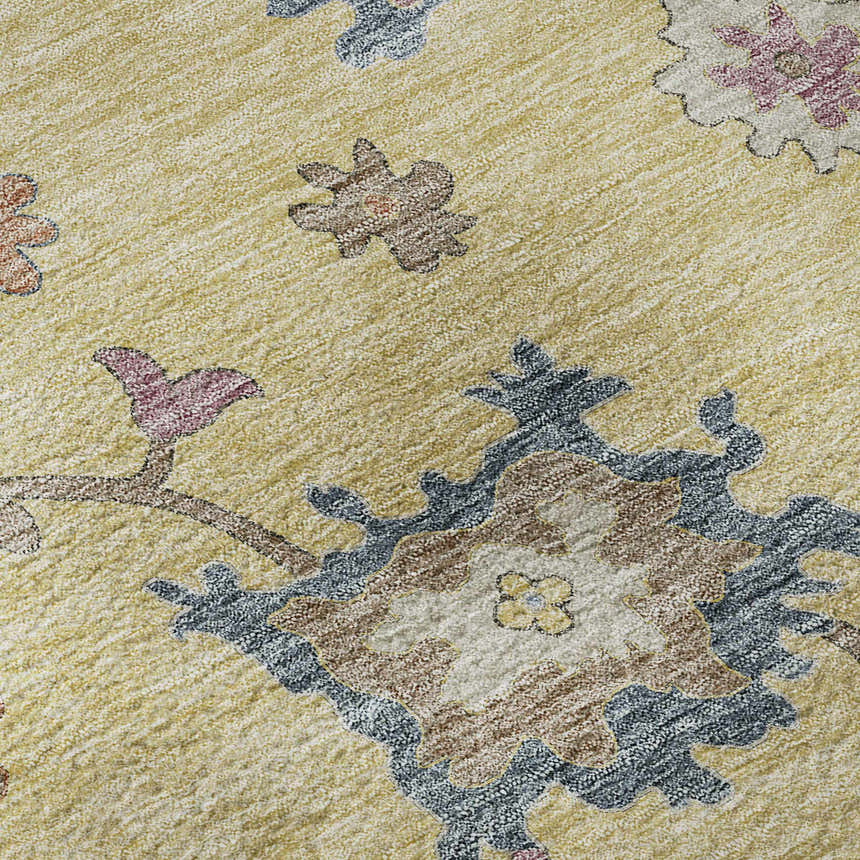 Close-up of the Dalyn Luxury Hatay HY4 Gold Washable Area Rug, featuring blush pink, chestnut, and navy floral patterns.