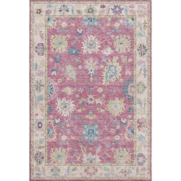 Close-up of the Dalyn Luxury Hatay HY7 Pink Washable Area Rug. Features a traditional floral pattern in pink, beige, and blue.