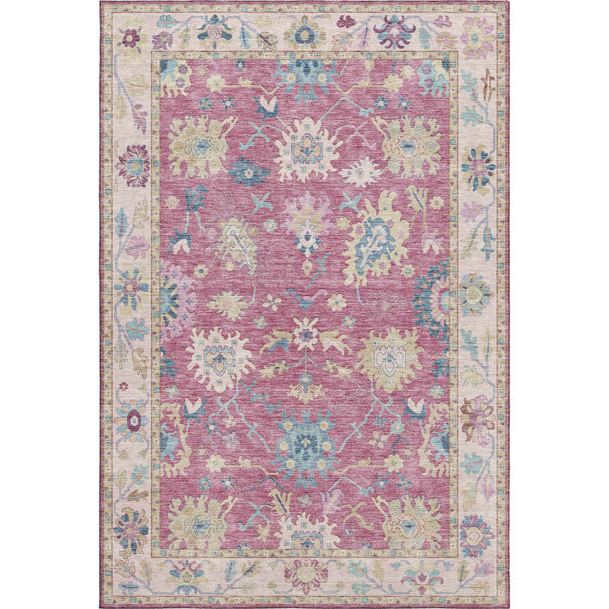 Close-up of the Dalyn Luxury Hatay HY7 Pink Washable Area Rug. Features a traditional floral pattern in pink, beige, and blue.