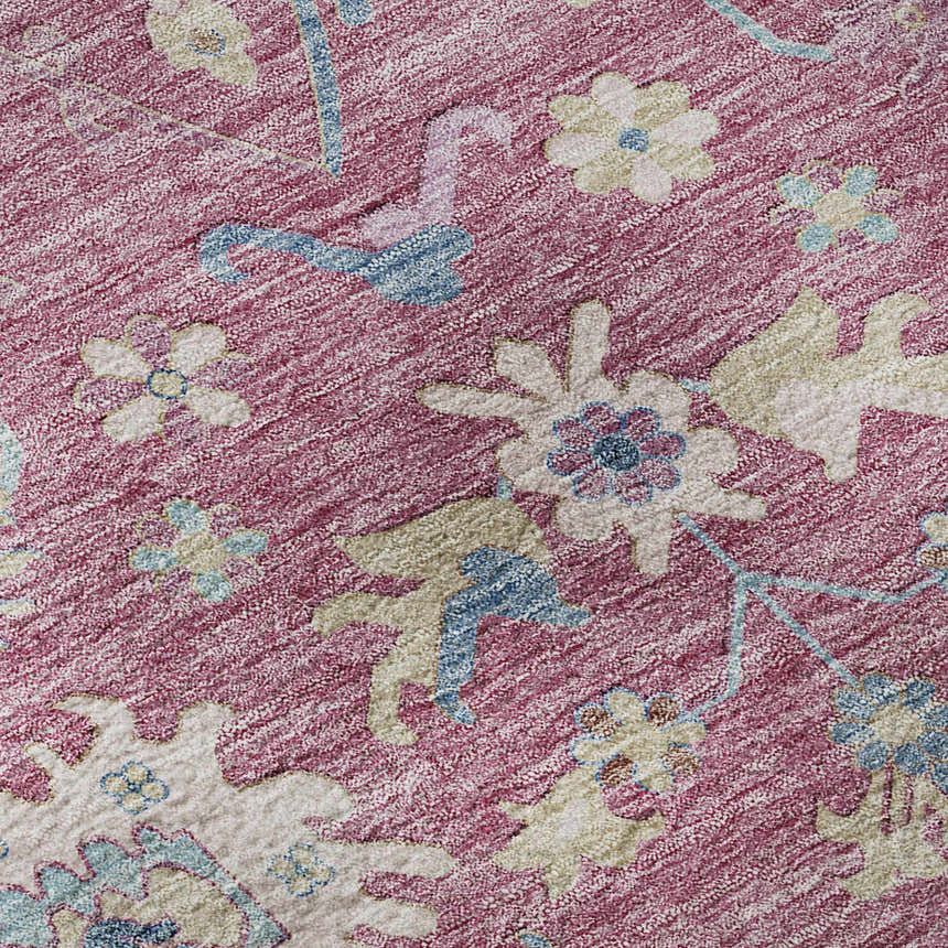 Close-up of the Dalyn Luxury Hatay HY7 Pink Washable Area Rug. Features a floral pattern in blush pink, beige, and light blue.