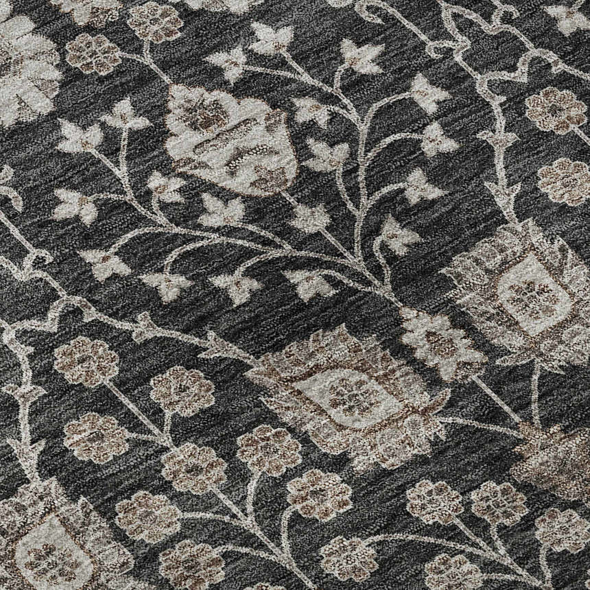 Close-up of the Dalyn Luxury Hatay HY8 Black Washable Area Rug. Features a beige and brown floral pattern on a black background.