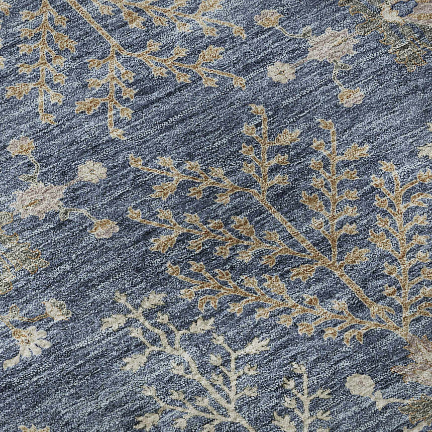 Close-up of the Dalyn Luxury Hatay HY9 Blue Washable Area Rug, featuring a floral and branch pattern in beige and brown tones.